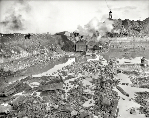 Photo showing: Steam Shovel -- Circa 1910. Steam shovel removing a section of coffer dam, Livingstone Channel, Detroit, Michigan.