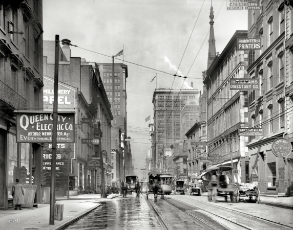 Photo showing: Fourth Street Firms -- Cincinnati, Ohio circa 1910. Everything electrical; also, ostrich feathers curled.