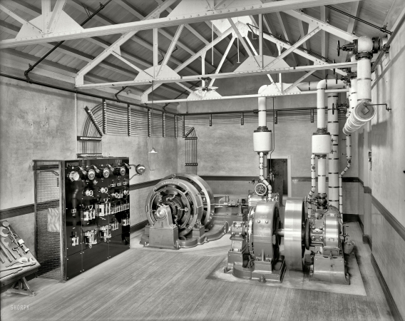 Photo showing: Dynamo Room -- Circa 1904. Dynamo room with switchboard.