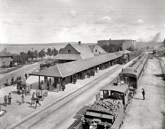 Photo showing: Now Arriving Petoskey -- R.R. station at Petoskey, Michigan, circa 1908.
