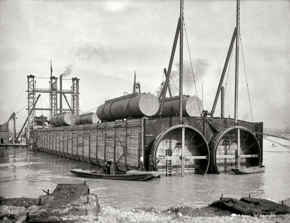Photo showing: Detroit River R.R. Tunnel -- The Detroit River circa 1910. Sinking last tubular section, Michigan Central Railroad tunnel.