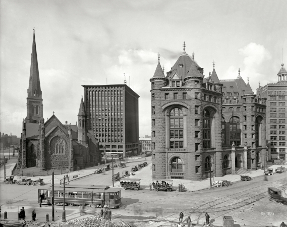 Photo showing: Shelton Square -- Buffalo, New York, circa 1908. St. Paul's Episcopal Cathedral, Prudential Building and Erie County Savings Bank.
