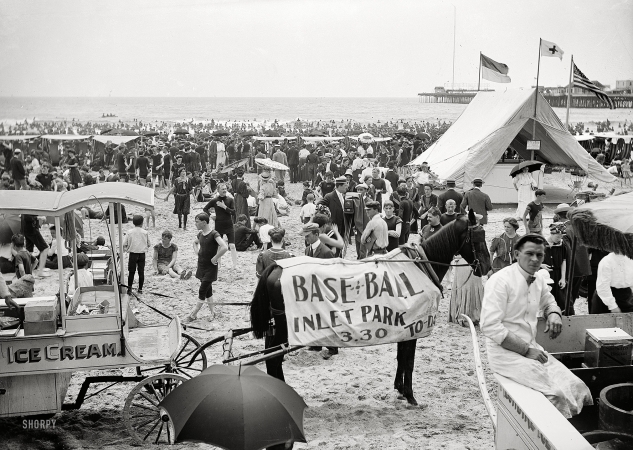 Photo showing: The Crowded Jersey Shore: 1906 -- On the beach, Atlantic City. Out on the pier, a DeForest wireless station.