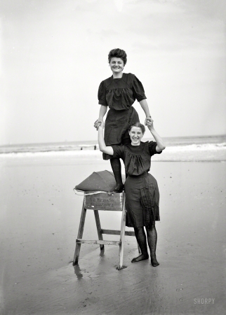 Photo showing: A.C. Bathing Beauties -- The Jersey Shore circa 1905. Bathing beauties playing on sawhorse.