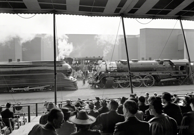 Photo showing: Railroad Pageant -- May 27, 1939. New York World's Fair, railroad pageant. Final curtain, locomotives.