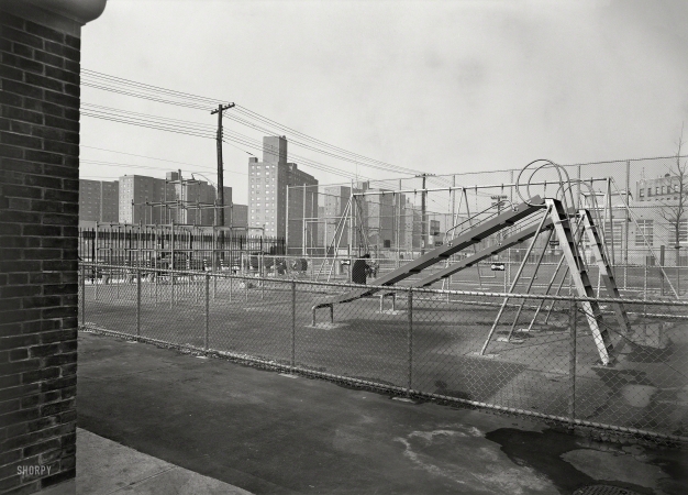 Photo showing: Swing Time -- Feb. 9, 1955. PS 122 playground, Kingsbridge Road and Bailey Avenue, the Bronx, New York.