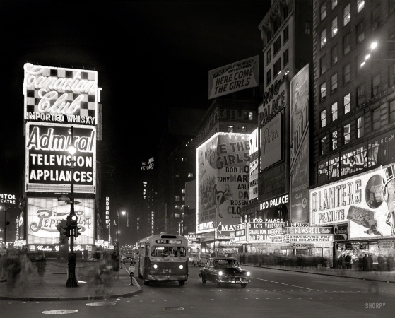 Photo showing: Here Come the Girls -- Dec. 29, 1953. New York City views. Times Square at night.