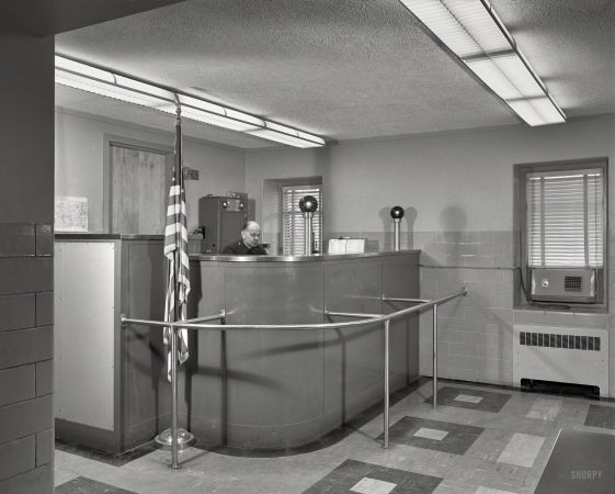 Photo showing: Police Desk -- Oct. 7, 1954. Police desk, Village Hall, Garden City, Long Island, N.Y. 