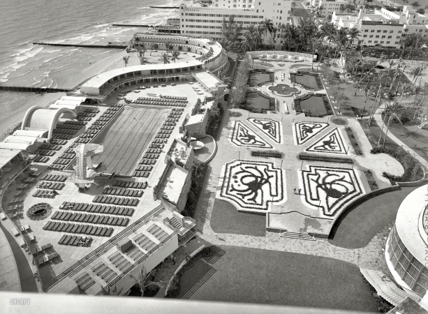 Photo showing: Miami Beach: 1955 -- March 30, 1955. Fontainebleau Hotel, Miami Beach. Roof view of pool, cabanas and garden. Morris Lapidus, architect.