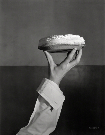 Photo showing: Pie Holder -- Washington, D.C., circa 1933. Pies and paper pie plates.