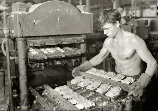 Photo showing: Making Babies -- 1936. Mt. Holyoke, Mass. - Paragon Rubber Co. and American Character Doll. Pressing rubber bodies (French).