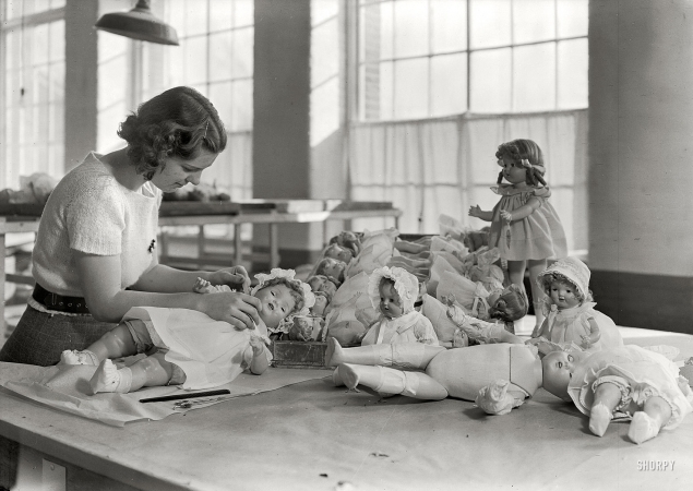 Photo showing: The Doll Dresser -- 1936. Mt. Holyoke, Mass. - Paragon Rubber Co. and American Character Doll. Dressing and packing dolls.