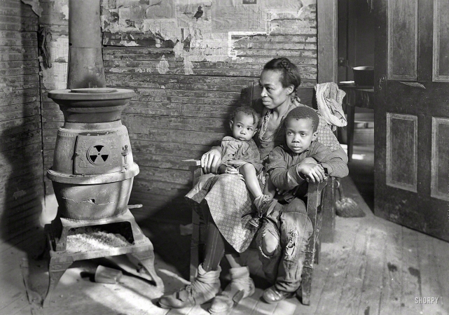 Photo showing: Hard Times -- March 1937. Scott's Run, West Virginia. Johnson family -- father unemployed.