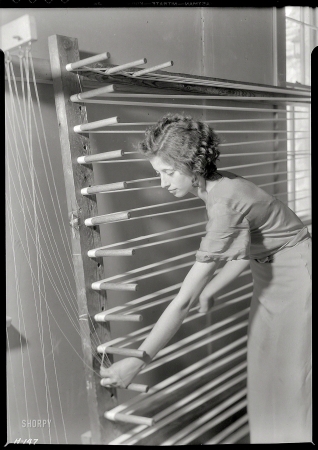 Photo showing: Beula Ogle -- November 1933. Gatlinburg, Tennessee. Beula Ogle preparing warp for weaving at the Pi Beta Phi School.