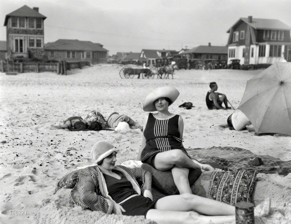 Photo showing: Taking the Air -- 1920s. Two unidentified women at Long Beach, New York.