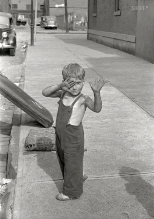 Photo showing: Boy of Steel -- July 1938. Steelworker's son. Pittsburgh, Pennsylvania.