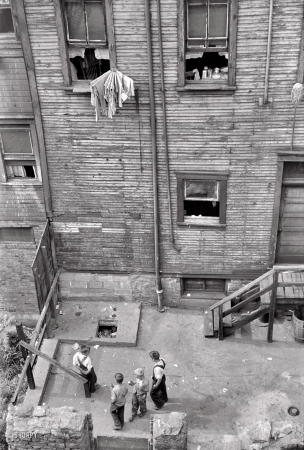 Photo showing: Rear Window -- July 1938. Slums in Pittsburgh, Pennsylvania.