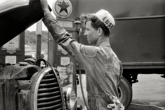 Photo showing: Capital Service -- June 1940. Washington, D.C. Attendant at truck service station on U.S. 1 (New York Avenue).