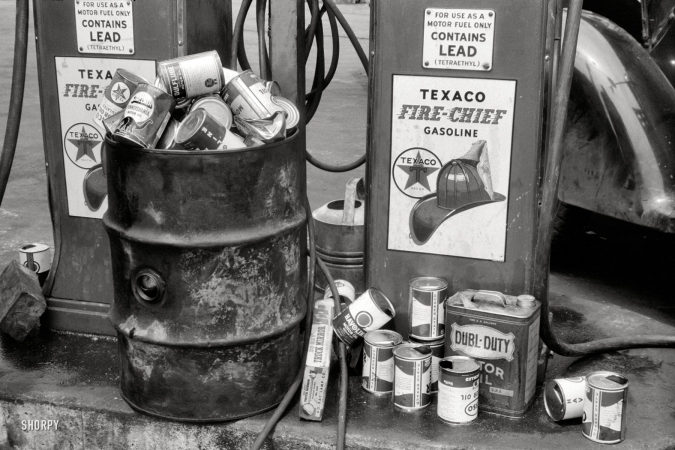 Photo showing: Texaco Fire-Chief -- June 1940. Washington, D.C. Discarded oil cans at truck service station on U.S. 1 (New York Avenue).