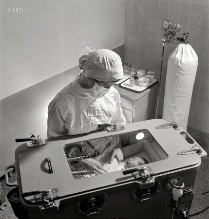 Photo showing: The Baby Box -- November 1942. Nurse training. Care of prematurely born babies in an incubator.