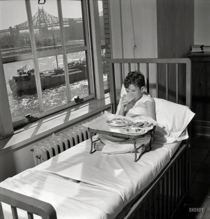 Photo showing: A Room With a View -- November 1942. Burn patient at Babies' Hospital, New York.