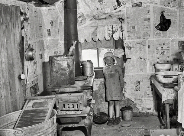 Photo showing: Paper Doll -- May 1936. Sharecropper shack. Kitchen of Ozarks cabin
purchased for Lake of the Ozarks project. Missouri.