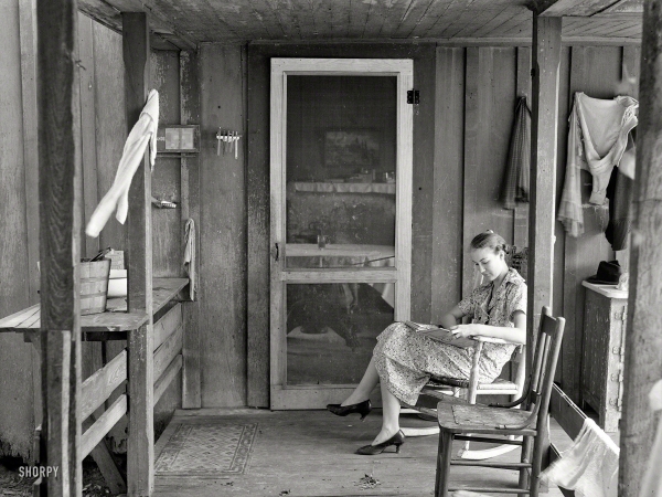 Photo showing: The Farmers Daughter -- September 1935. Daughter of resettled farmer. Irwinville Farms, Georgia.