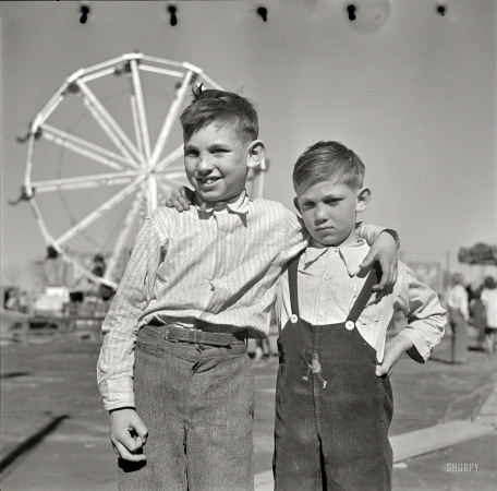 Photo showing: Fair Farm Boys: 1936 -- April 1936. Farm boys of the Pecos Valley, New Mexico, at carnival in Roswell.