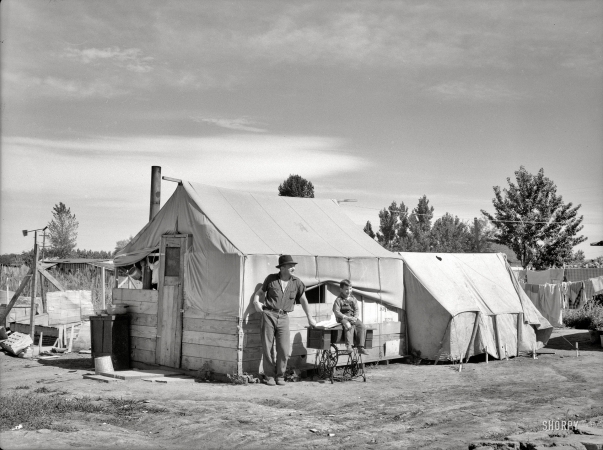Photo showing: Our New Life -- July 1936. Migratory workers' camp in Yakima, Washington.