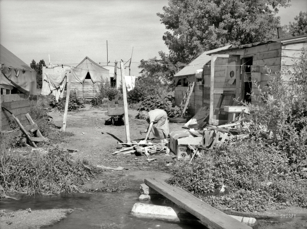 Photo showing: Crate and Barrel -- July 1936. Migratory fruit pickers' camp in Yakima, Washington.