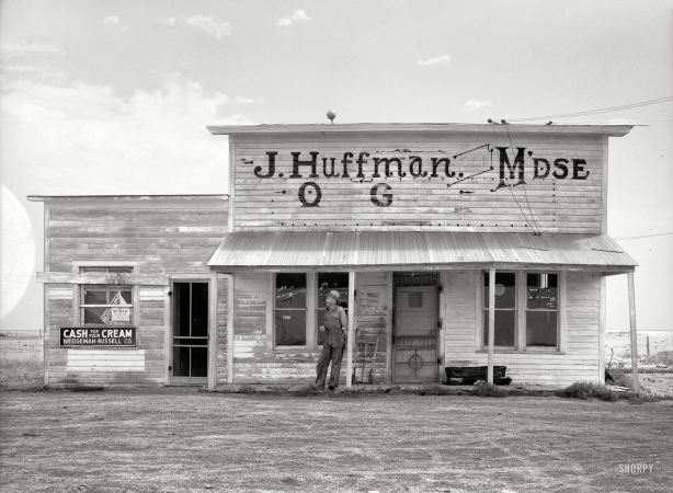 Photo showing: General Merchandise -- July 1936. J. Huffman of Grassy Butte, North Dakota, has been forced to close his general store on account of the drought.