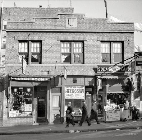 Photo showing: Every Egg Guaranteed -- December 1936. Store at which Mrs. Hotchfield does her shopping. Washington Avenue, the Bronx.