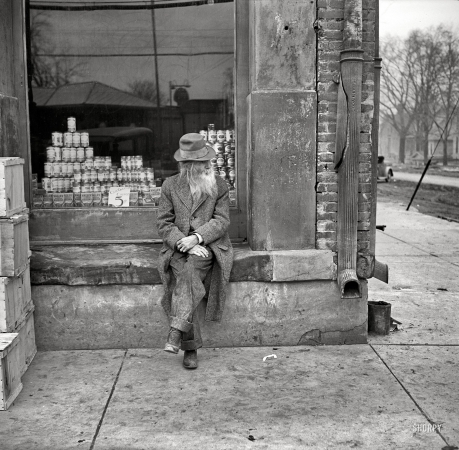 Photo showing: The Old Man and the Street -- April 1937. Old man on the street in Shawneetown, Illinois.