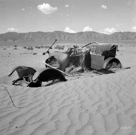 Photo showing: Pavement Ends -- March 1937. Wind erosion has desolated this once luxuriant bunch grass country in Idaho.