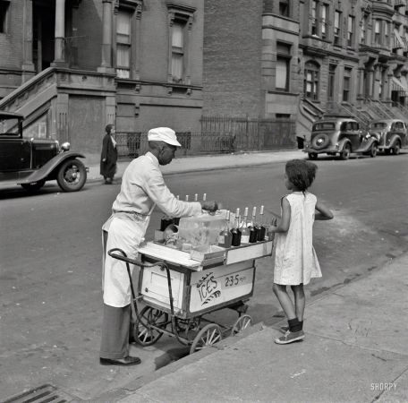 Photo showing: Cold Comfort -- New York, summer 1938. Street vendor of shaved ices.