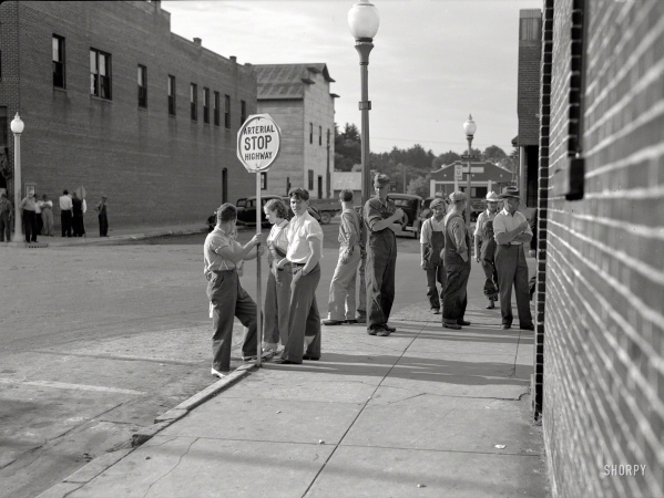 Photo showing: Arterial Stop -- June 1937. Street corner. Black River Falls, Wisconsin.