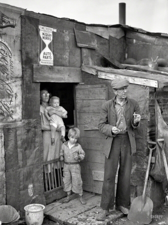 Photo showing: Coke House -- January 1939. Herrin, Illinois. Family on relief living in shanty at city dump.