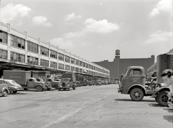 Photo showing: Produce Trucks -- Chicago, July 1941. Produce market where commission merchants sell to retailers.
