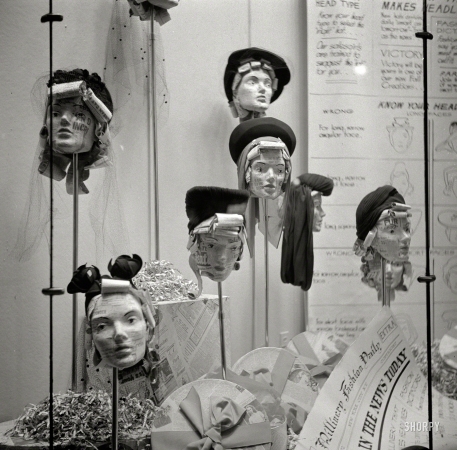 Photo showing: Faces in the News -- October 1941. Manikins in store window. Amsterdam, New York.
