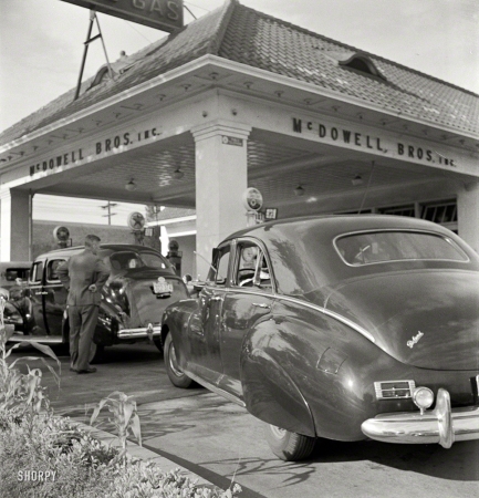 Photo showing: Gas Rationing -- Washington, D.C. At 7 a.m. on June 21, 1942, the day before stricter gas rationing was
enforced, cars were pouring into this gas station on upper Wisconsin Avenue.