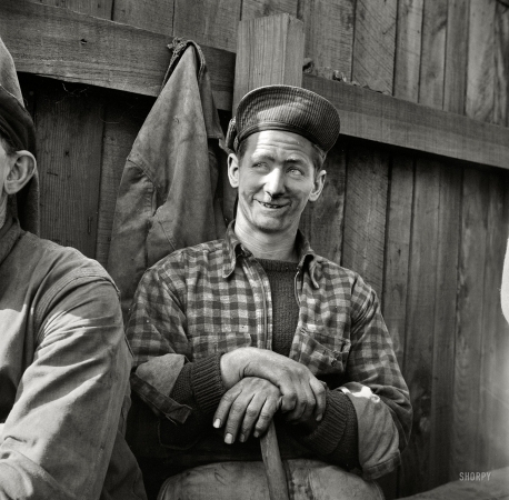 Photo showing: Oswego Stevedore -- October 1941. Oswego, New York. French-Canadian stevedore at port of Oswego, point of entry for Great Lakes shipping.