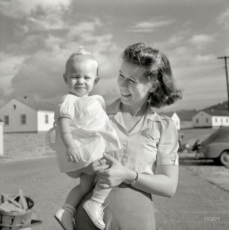 Photo showing: The Happy Hendersons -- October 1941. Radford, Virginia. Mrs. M.B. Henderson, wife of defense worker, and daughter, in Sunset Village FSA project.
