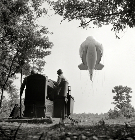 Photo showing: Untethered: 1942 -- May 1942. Parris Island, S.C. Tactical formations of barrage balloons prevent dive bombing of
ground installations. The Leathernecks are developing an excellent technique.