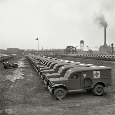 Photo showing: Dodge Army Ambulances -- August 1942. Detroit, Michigan. Chrysler Corporation Dodge truck plant. Dodge ambulances lined up for delivery to the Army.