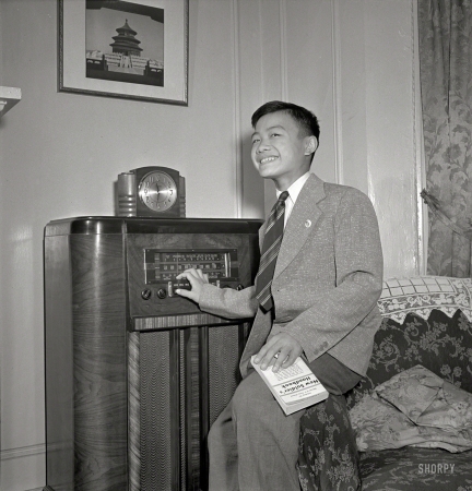 Photo showing: The War Comes to Flatbush -- August 1942. New York. Chinese-American boy in his home in Flatbush.
