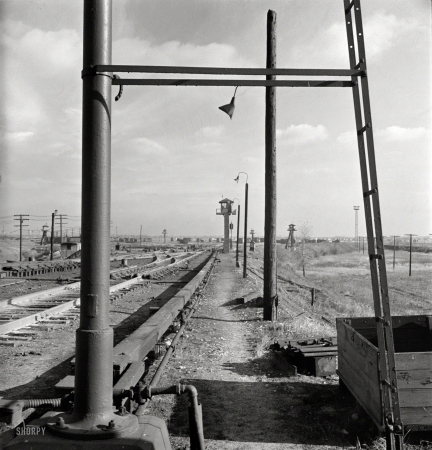 Photo showing: The Railyard -- November 1942. Chicago. North classification yard and retarder operator's tower at Illinois Central railroad yard.