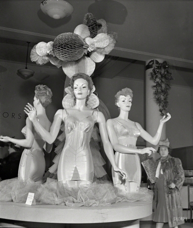 Photo showing: Lingerie Amazons -- December 1942. New York. Corset display at R.H. Macy & Co. department store.