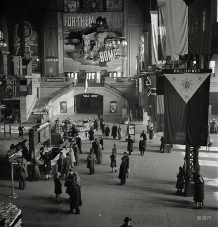 Photo showing: For Them, Bombs -- January 1943. Chicago, Illinois. Union Station train concourse.