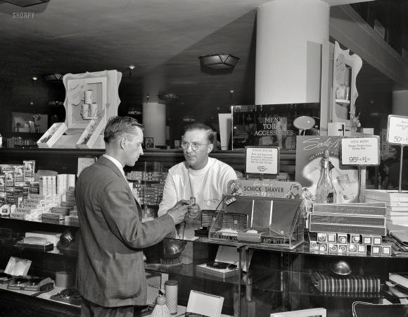 Photo showing: Give Him a Schick -- July 1941. Detroit, Michigan. Men's toilet accessories department at the Crowley-Milner department store.