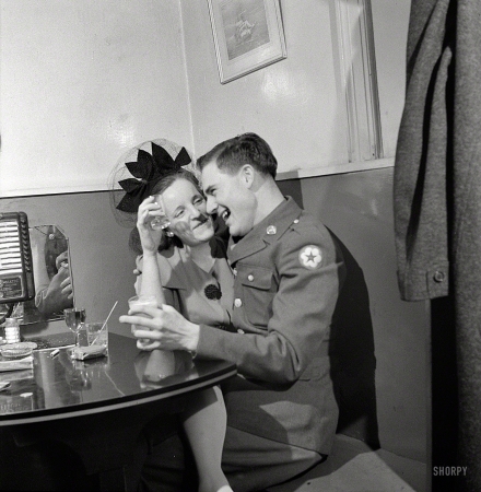 Photo showing: Joint Maneuvers -- April 1943. Washington, D.C. Slightly inebriated couple at the Sea Grill.